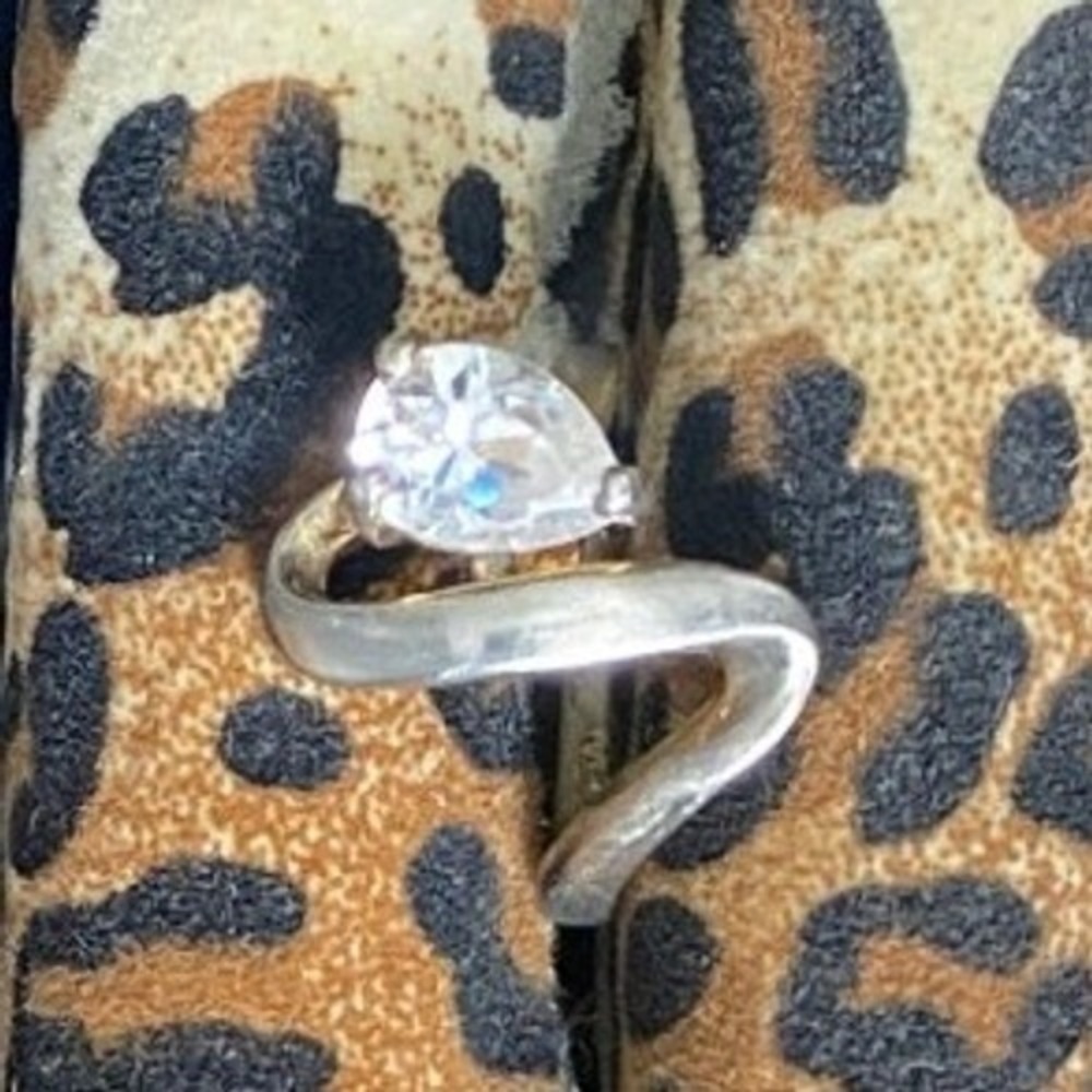 Silver-Tone Bypass Ring with Pear Cut Clear CZ Stone – Fashion Costume Jewelry